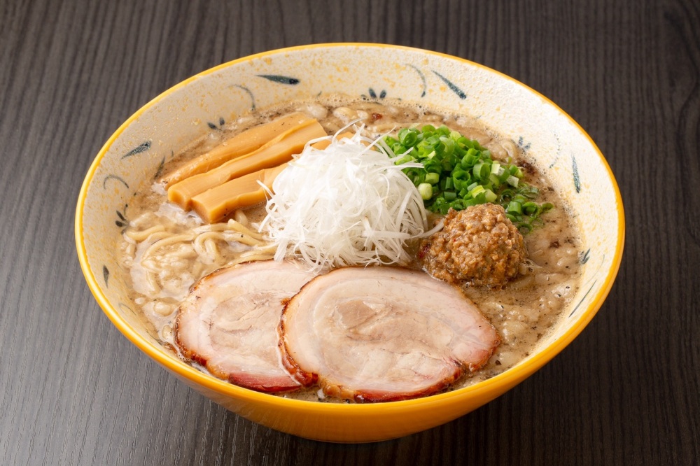 Miso Ramen made with fish stock and lard at Sapporo Fujiya. The pork fillet, roasted in a hanging pot, is extremely juicy and not to be missed!