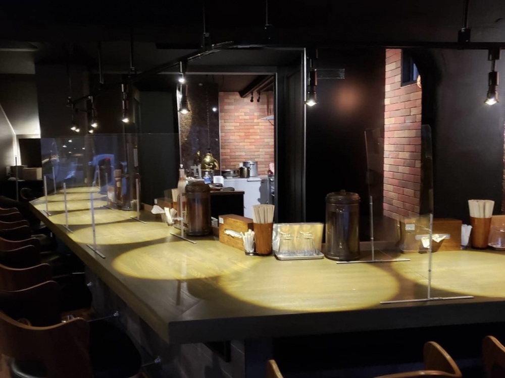 The interior of Amewayasashiku, No.2. Overhead lights make your bowl of Ramen the star of the show.